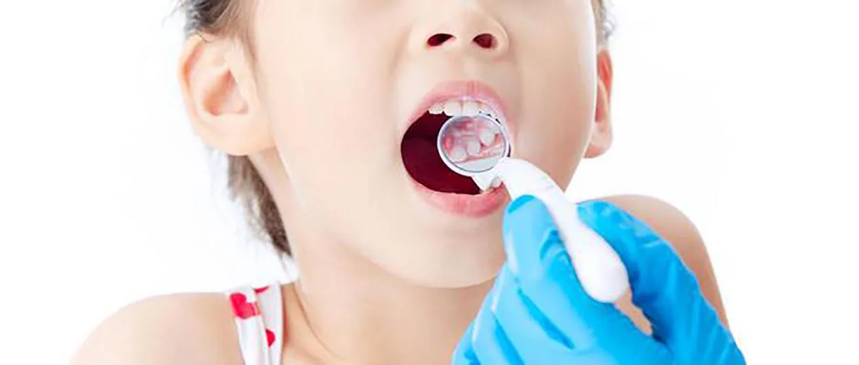 regular oral examinations to prevent dental caries in children